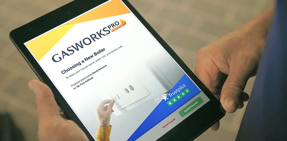 Person holding tablet showing the cover page of a proposal for a new boiler