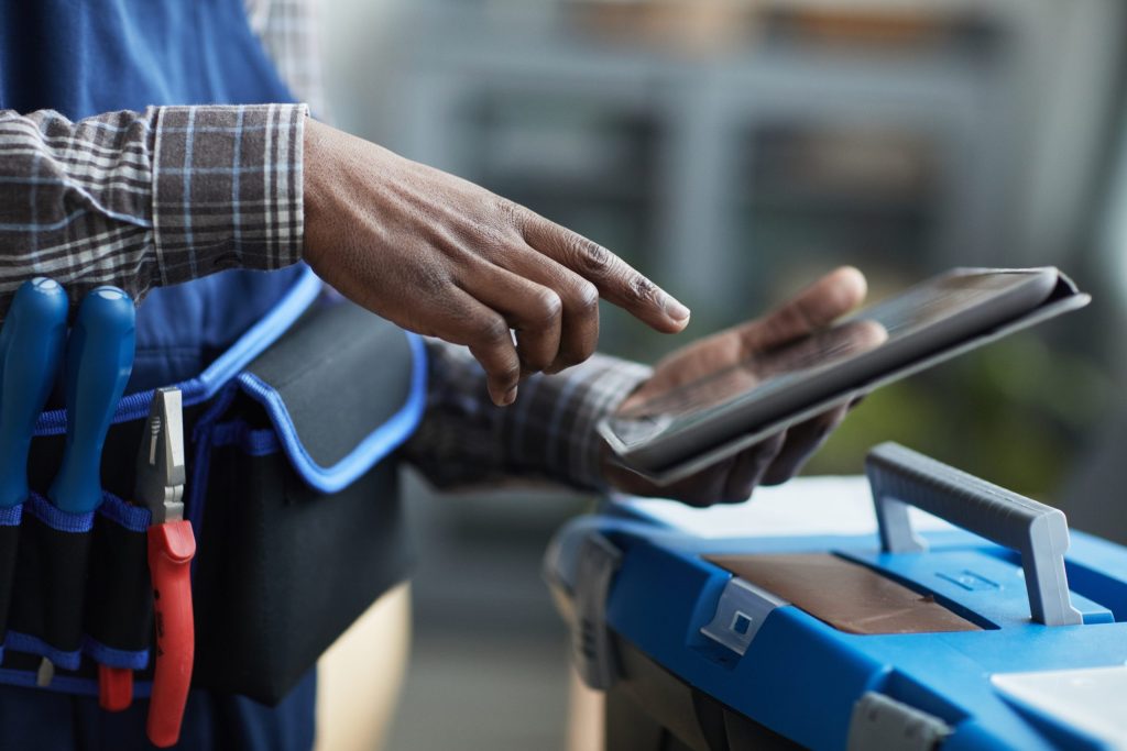 Person completing inventory on an iPad