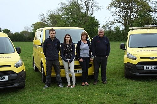 AS Kingdon team members stood in front of company fleet