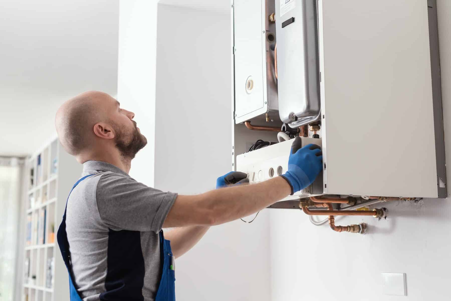 engineer working on boiler installation and maintenance