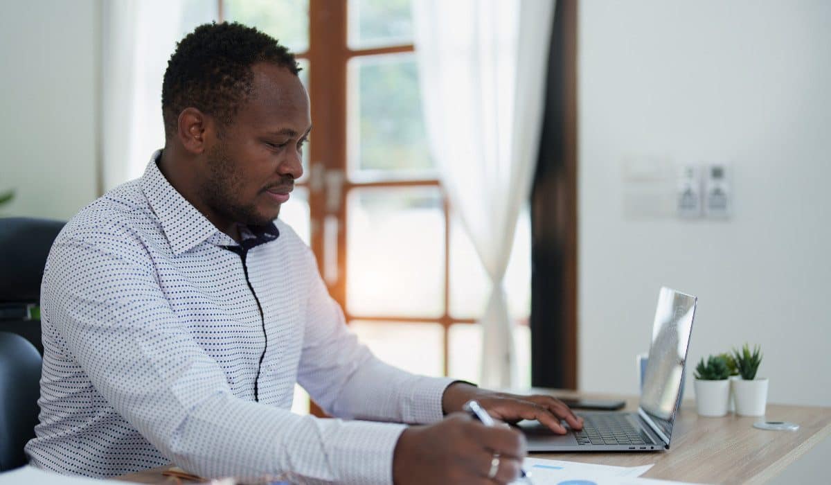 Man working at his desk on a laptop